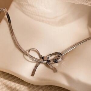 Elegant Silver Bow Necklace